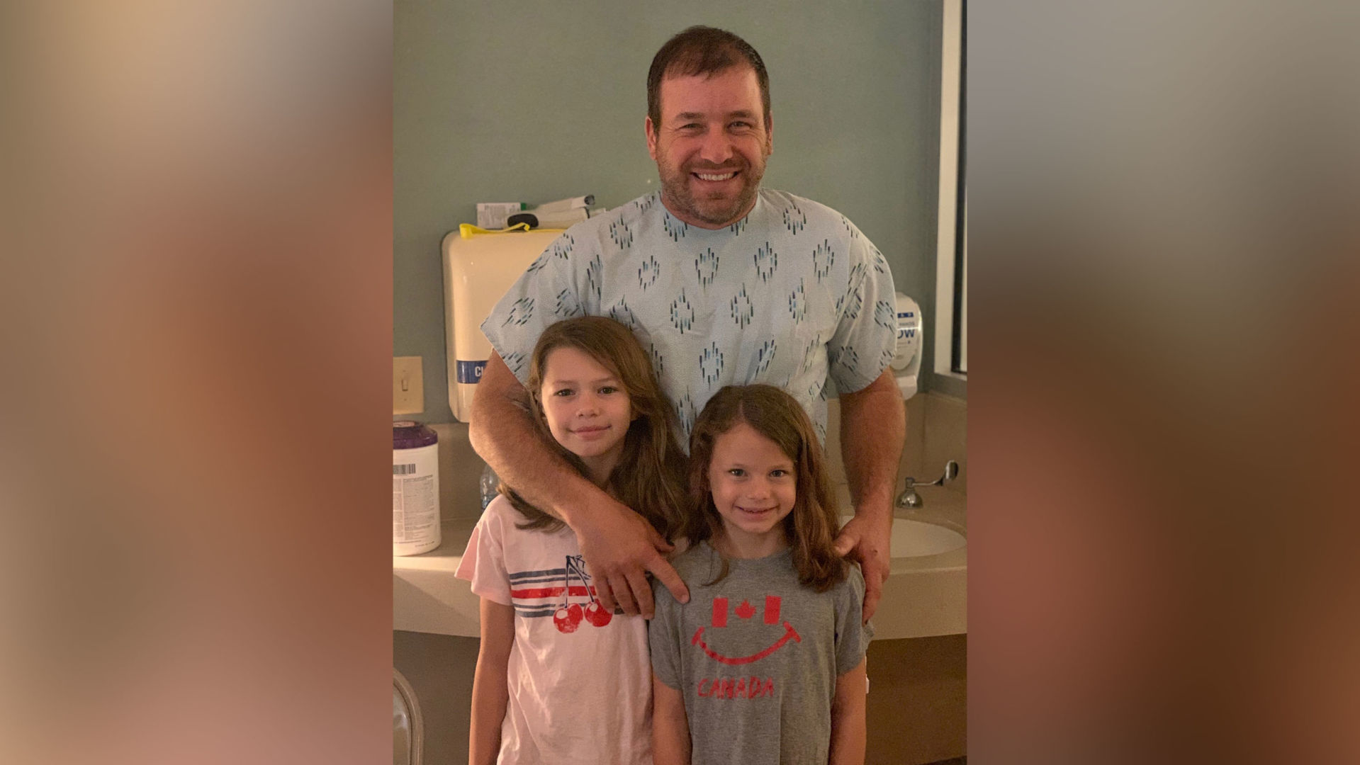 Ryan Newman with his two daughters
